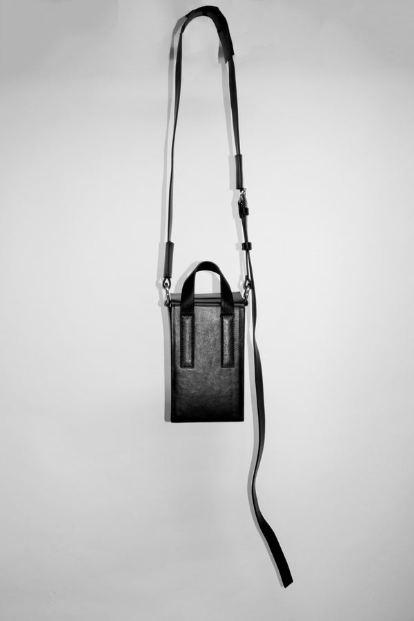Model Amber Valletta designs cactus leather handbag for Karl Lagerfeld  accessories collection